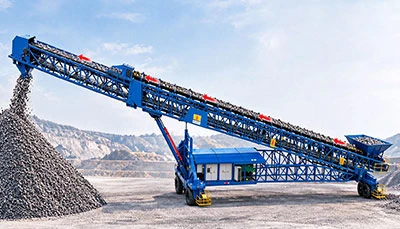 How Does a Stacker Conveyor Work?